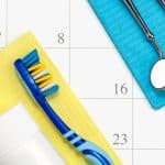 a calender with various dental tools