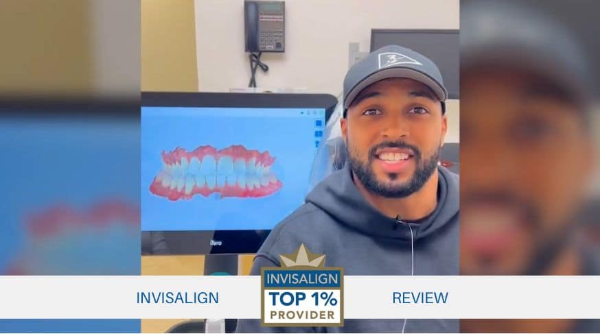 Man smiling after Invisalign treatment